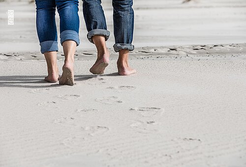 Spaziergänger auf Juist am Strand